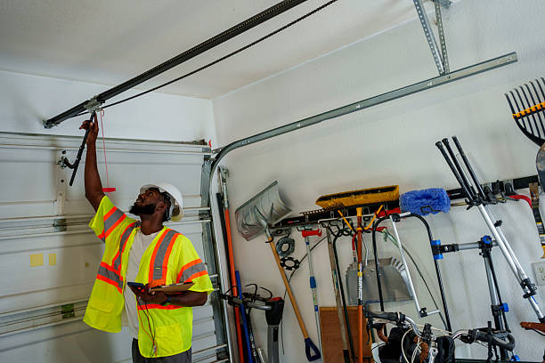 Professional Garage Door Panel Replacement technician working in Scotchtown, NY